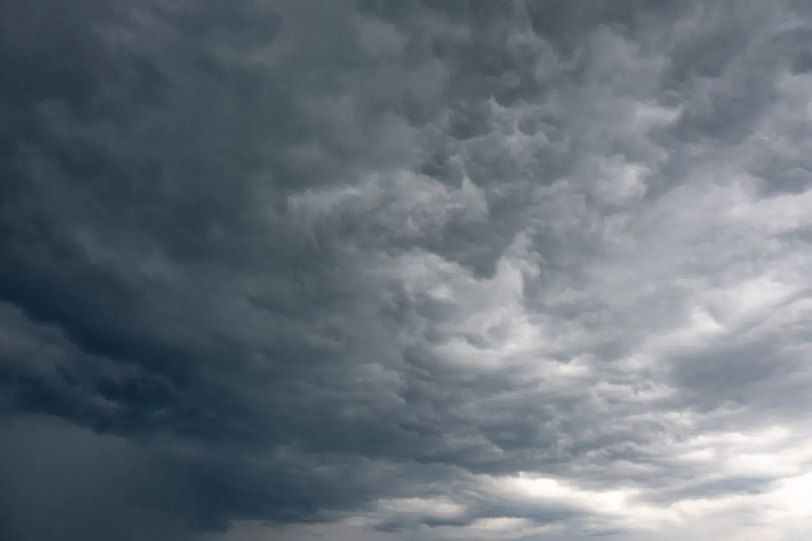 Storm clouds gathering over a landscape — manipulative link schemes bring penalties, not rankings
